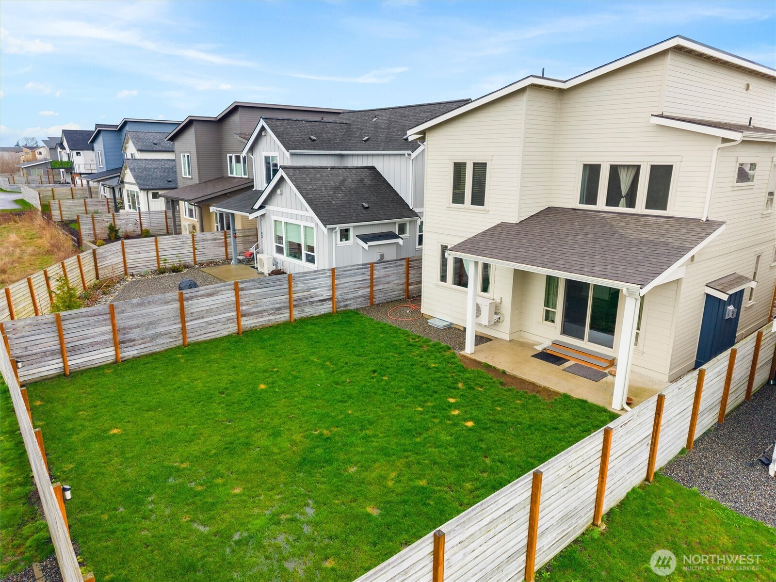 703 Northview Street Bellingham, WA 98226 - Photo 31 of 40 a view of a house with a yard and sitting area