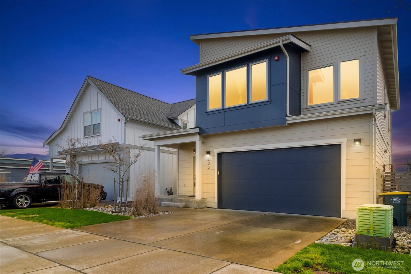 703 Northview Street Bellingham, WA 98226 - Photo 33 of 40 a view of a house with a patio and a yard