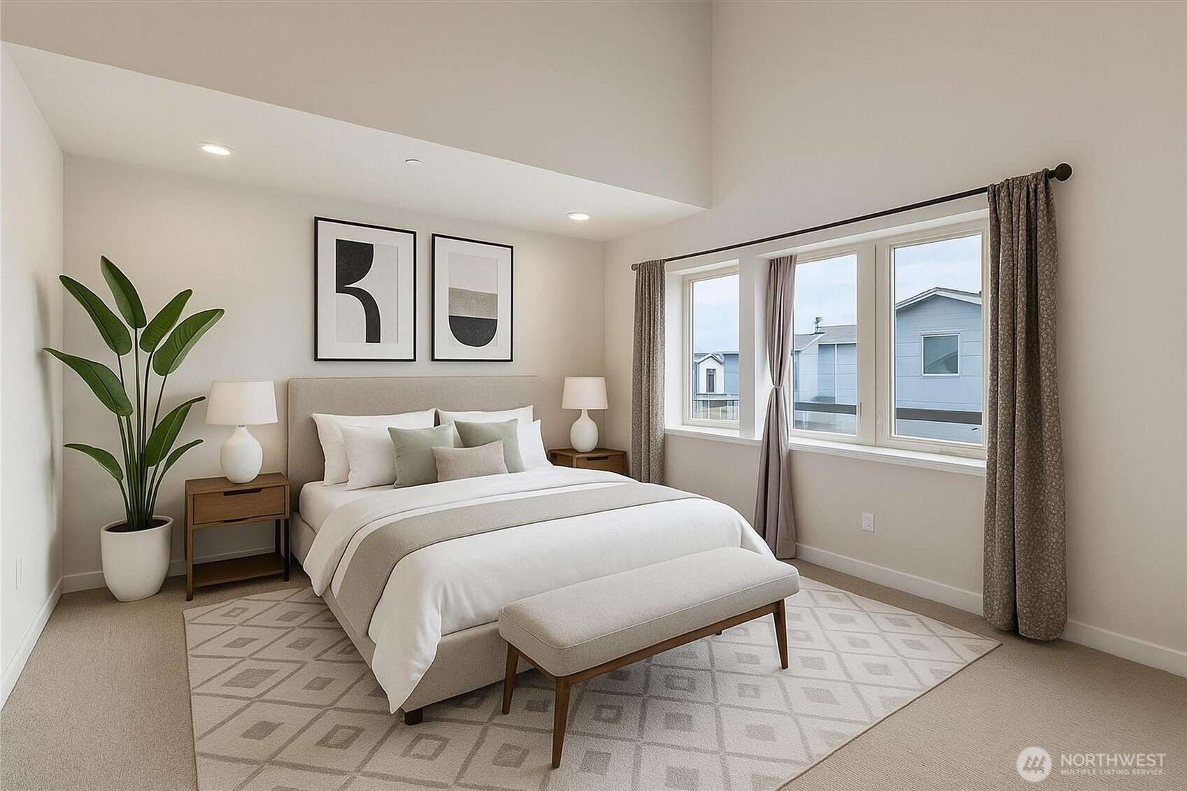 703 Northview Street Bellingham, WA 98226 - Photo 10 of 40 a bedroom with a large bed and a potted plant
