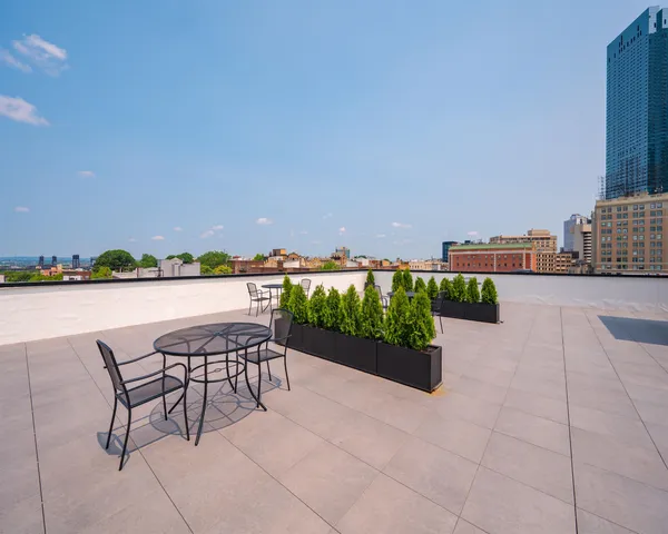 a view of a terrace with sitting area