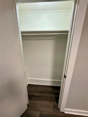 a bathroom with a sink a toilet a mirror and vanity