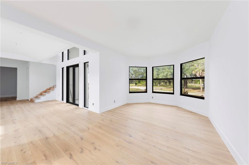 5461 Park Road Fort Myers, FL 33908 - Photo 28 of 41 a view of an empty room with a window and front door