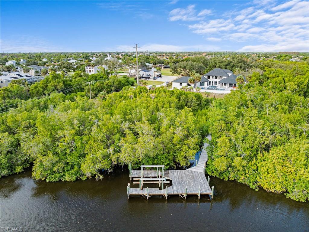 5461 Park Road Fort Myers, FL 33908 - Photo 31 of 41 a view of a garden with lawn chairs