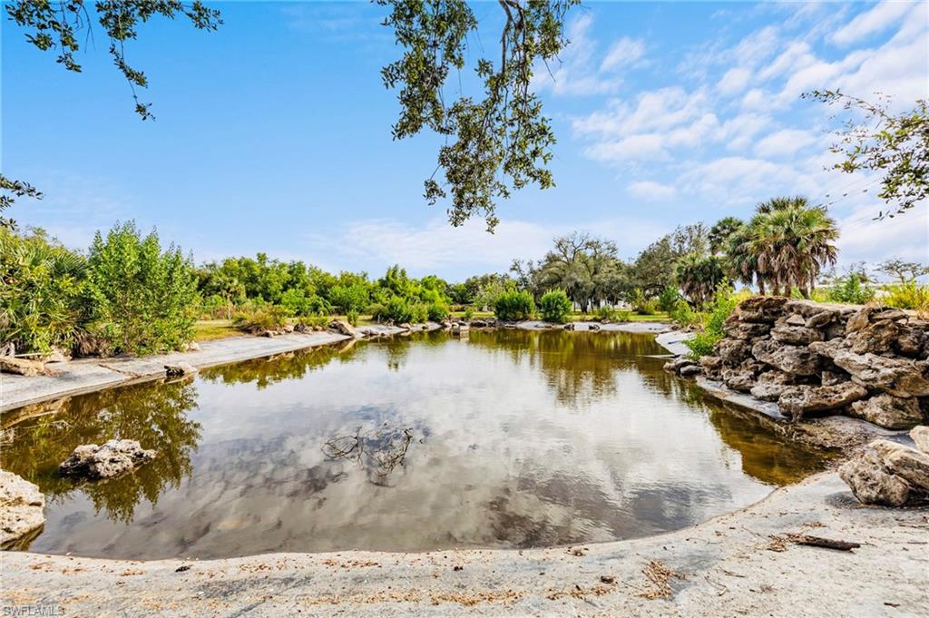 5461 Park Road Fort Myers, FL 33908 - Photo 34 of 41 a view of a lake with a beach