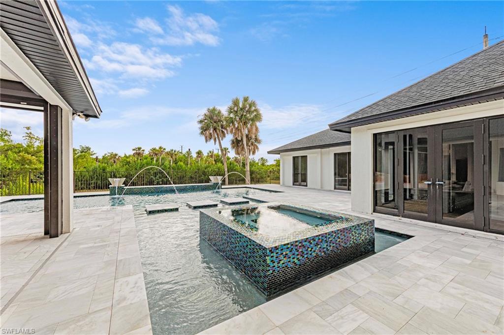 5461 Park Road Fort Myers, FL 33908 - Photo 4 of 41 a view of a house with swimming pool and sitting area