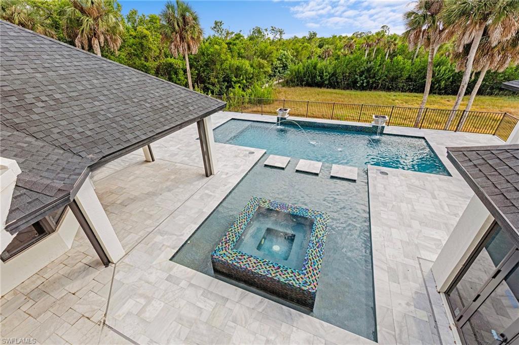 5461 Park Road Fort Myers, FL 33908 - Photo 5 of 41 swimming pool view with a sitting space