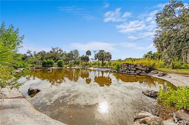 a view of a lake with outdoor space