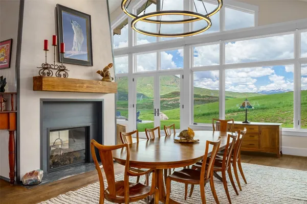 a view of a dining room with furniture window and outside view