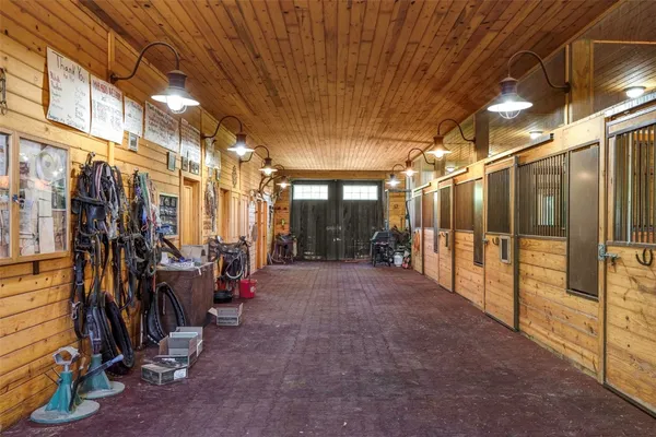 a view of a room with wooden walls