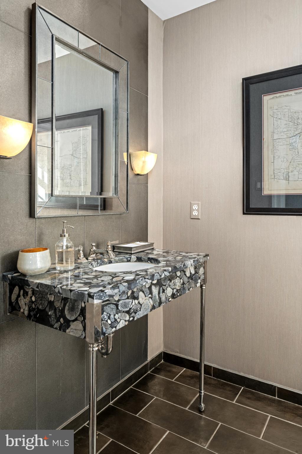 648 Creighton Road Villanova, PA 19085 - Photo 13 of 26 a bathroom with a granite countertop sink a toilet and mirror