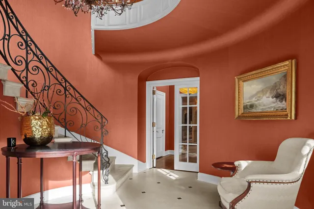 a view of staircase with furniture and stairs