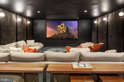 a view of a street with large trees