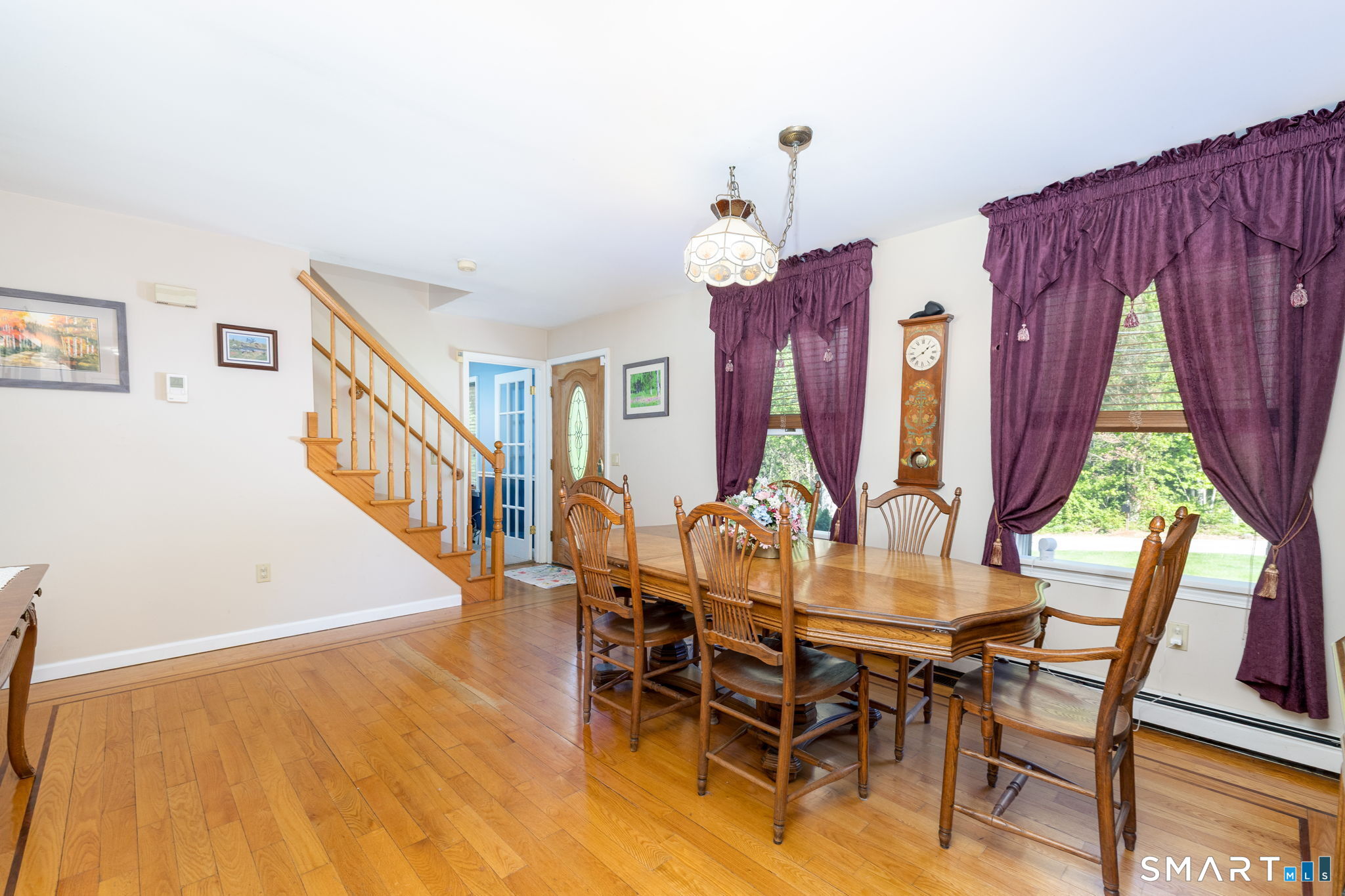 39 Chapman Road Marlborough, CT 06447 - Photo 7 of 40 a view of a dining room with furniture and a window