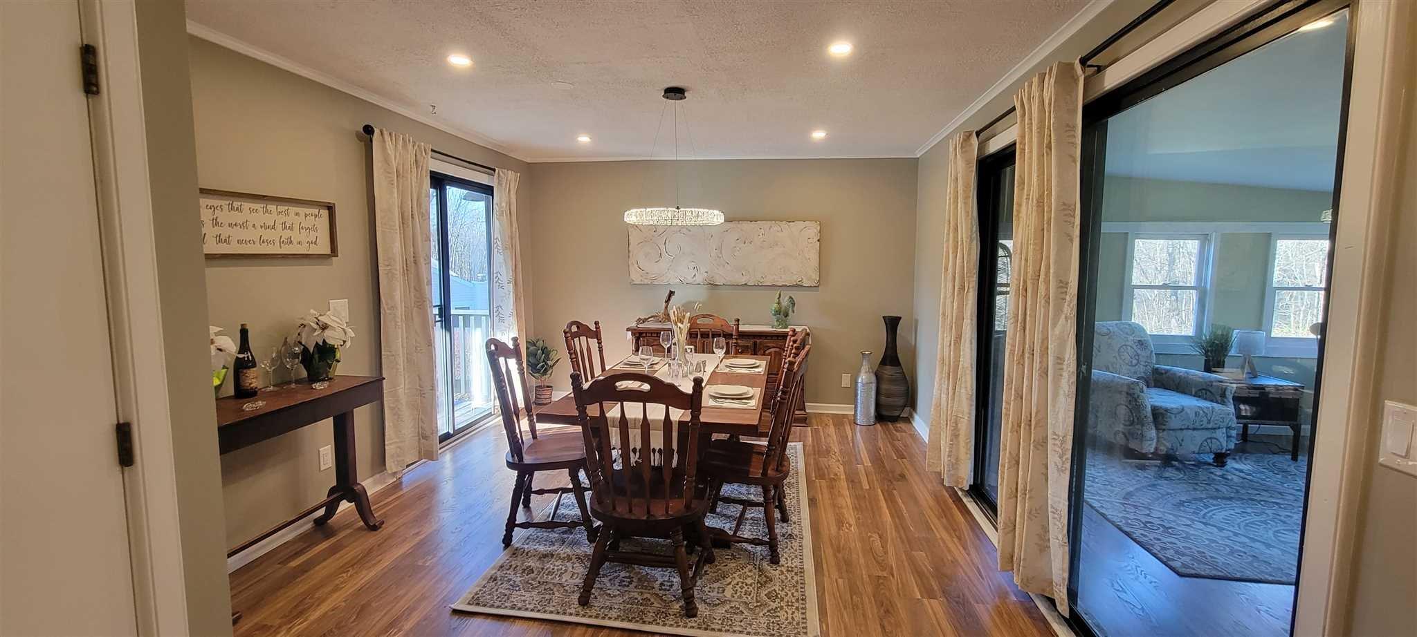 5 Haymaker Lane Plattekill, NY 12589 - Photo 11 of 37 a view of a dining room with furniture and wooden floor