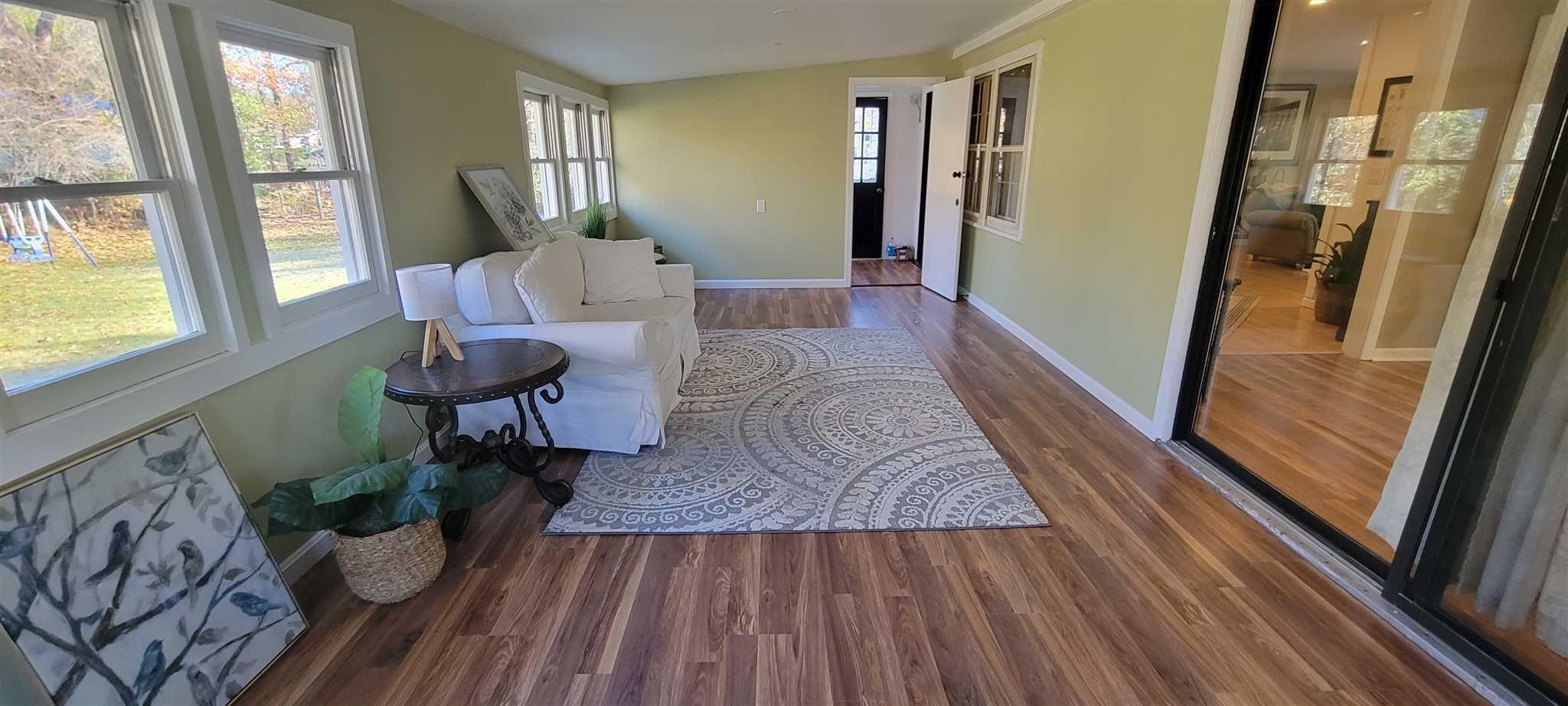 5 Haymaker Lane Plattekill, NY 12589 - Photo 13 of 37 a living room with furniture and a wooden floor