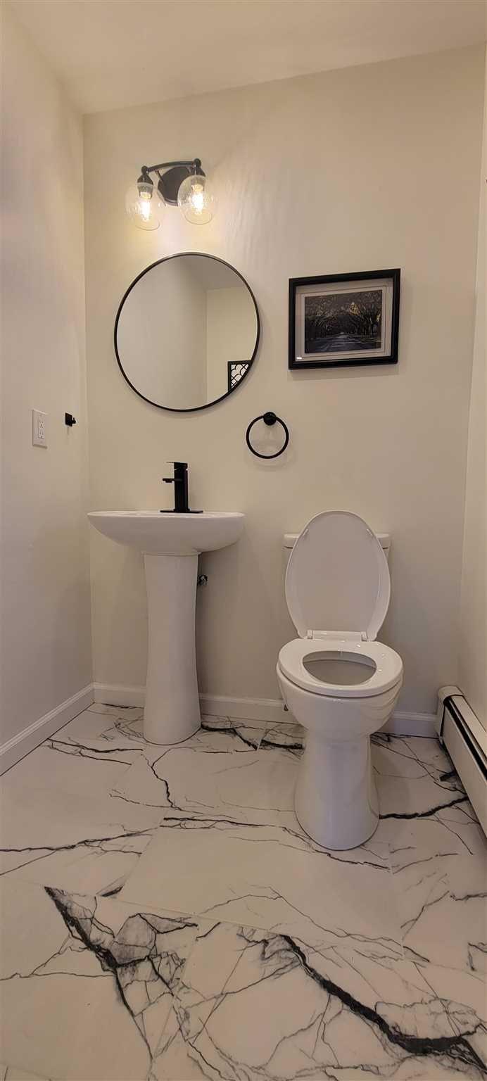 5 Haymaker Lane Plattekill, NY 12589 - Photo 19 of 37 a bathroom with a toilet and a mirror