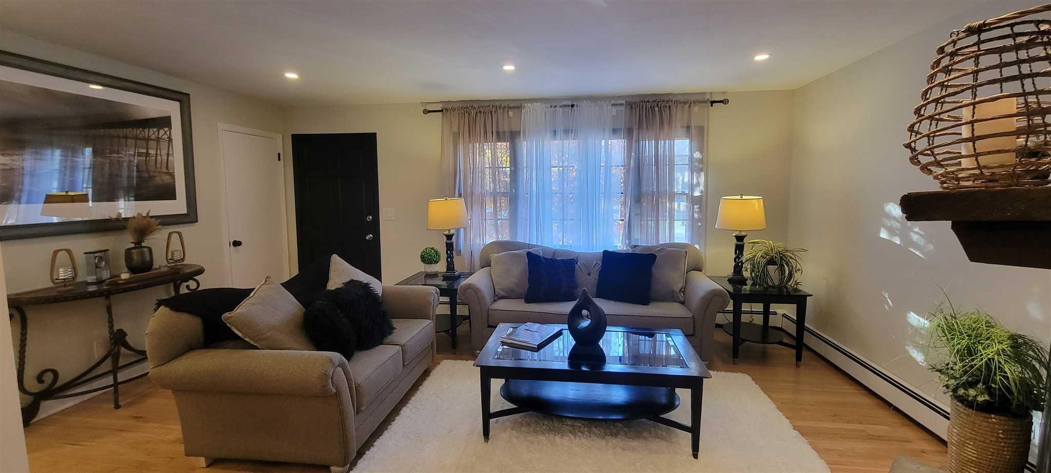 5 Haymaker Lane Plattekill, NY 12589 - Photo 3 of 37 a living room with furniture and wooden floor