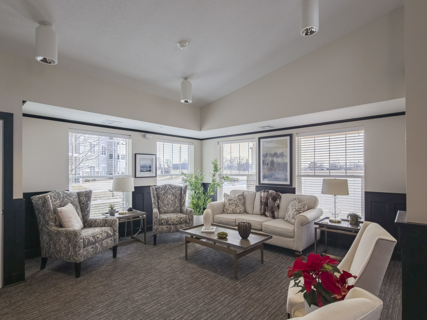 2592 Middle Road, Unit 313 Bettendorf, IA 52722 - Photo 8 of 52 a living room with furniture and large windows