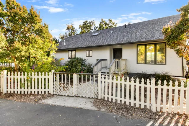 a front view of a house having yard