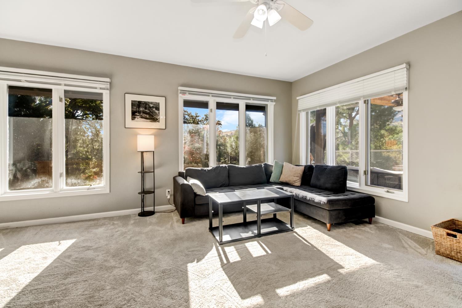30640 County Road 86 Winters, CA 95694 - Photo 11 of 87 a living room with furniture and large windows