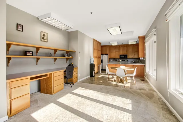 a kitchen with stainless steel appliances granite countertop a stove and a sink