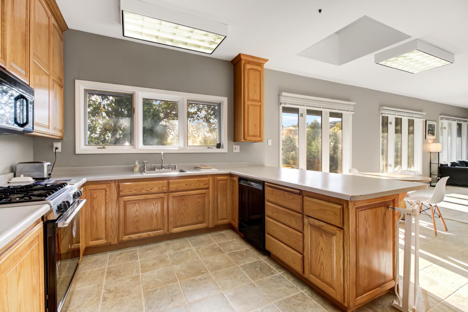 30640 County Road 86 Winters, CA 95694 - Photo 18 of 87 a kitchen with stainless steel appliances granite countertop a stove and a sink