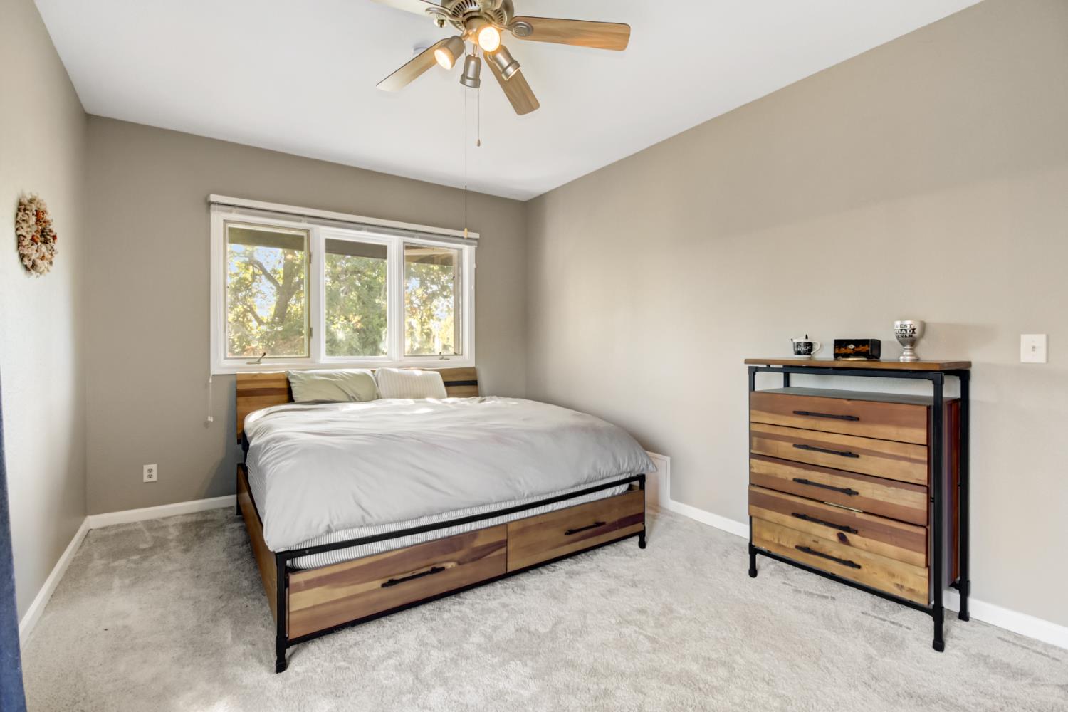 30640 County Road 86 Winters, CA 95694 - Photo 20 of 87 a bedroom with a bed and a chandelier