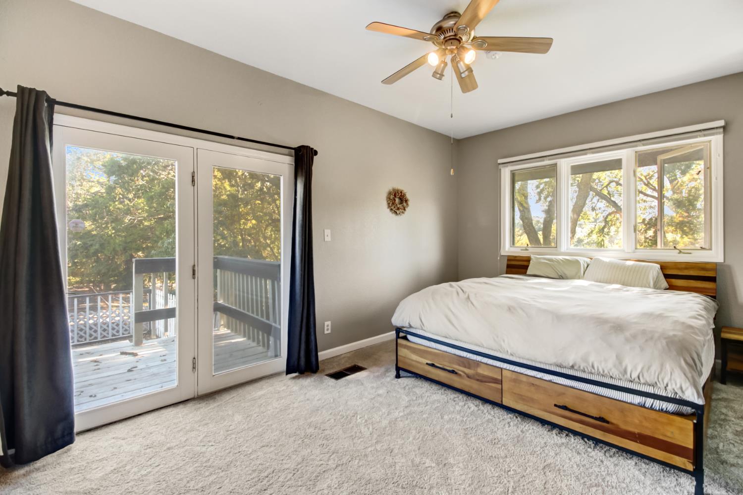 30640 County Road 86 Winters, CA 95694 - Photo 21 of 87 a bed sitting in a spacious bedroom next to a window