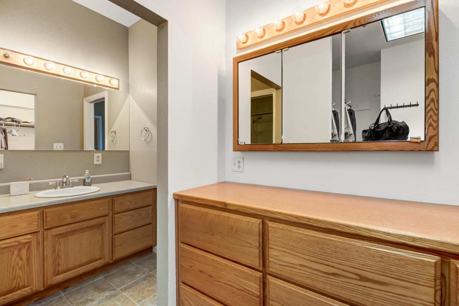 30640 County Road 86 Winters, CA 95694 - Photo 23 of 87 a bathroom with a sink and a mirror
