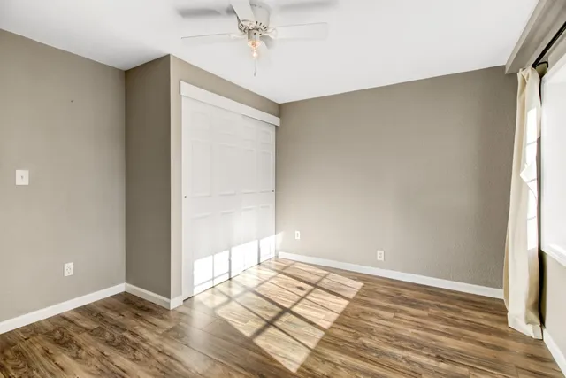 a house with trees in front of it