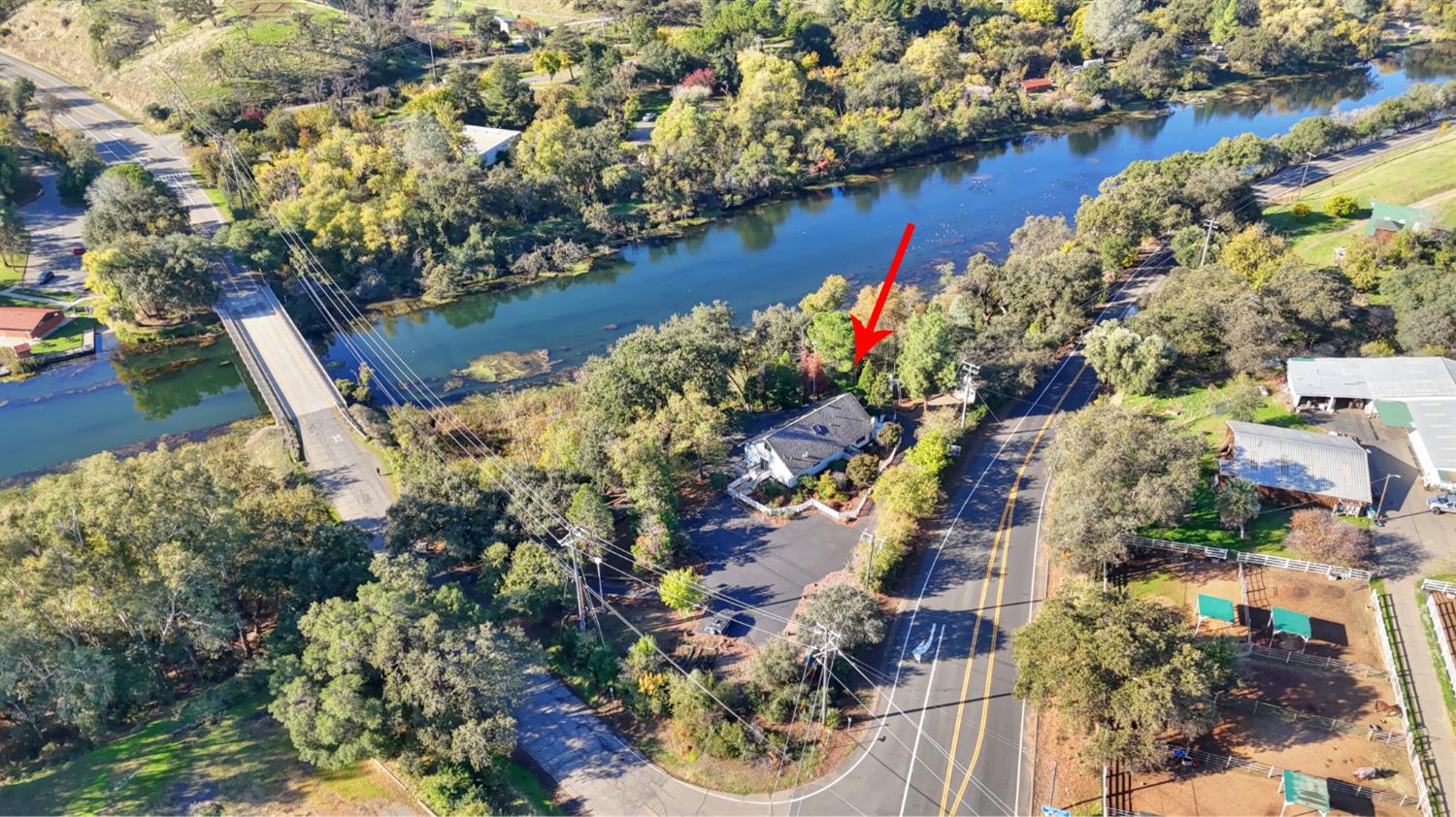 30640 County Road 86 Winters, CA 95694 - Photo 83 of 87 an aerial view of lake residential house with swimming pool and outdoor space