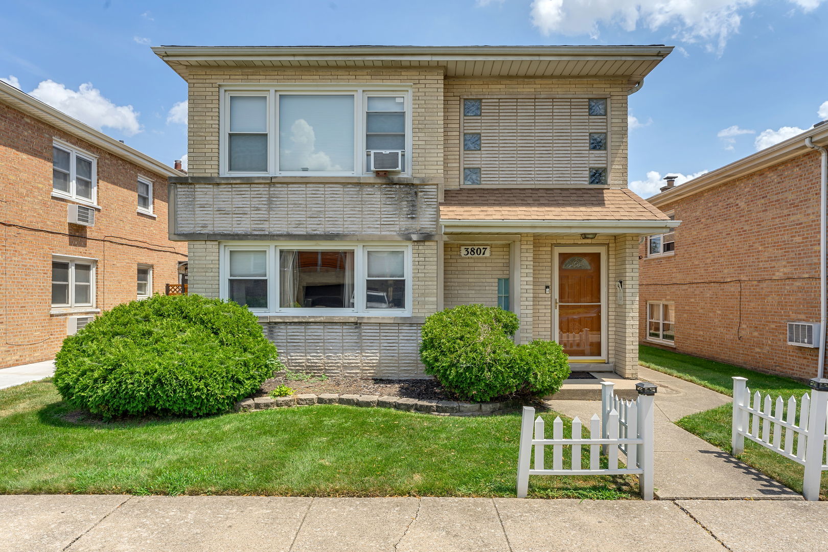 3807 Scoville Avenue Berwyn, IL 60402 - Photo 2 of 17 a view of a house with a yard and plants