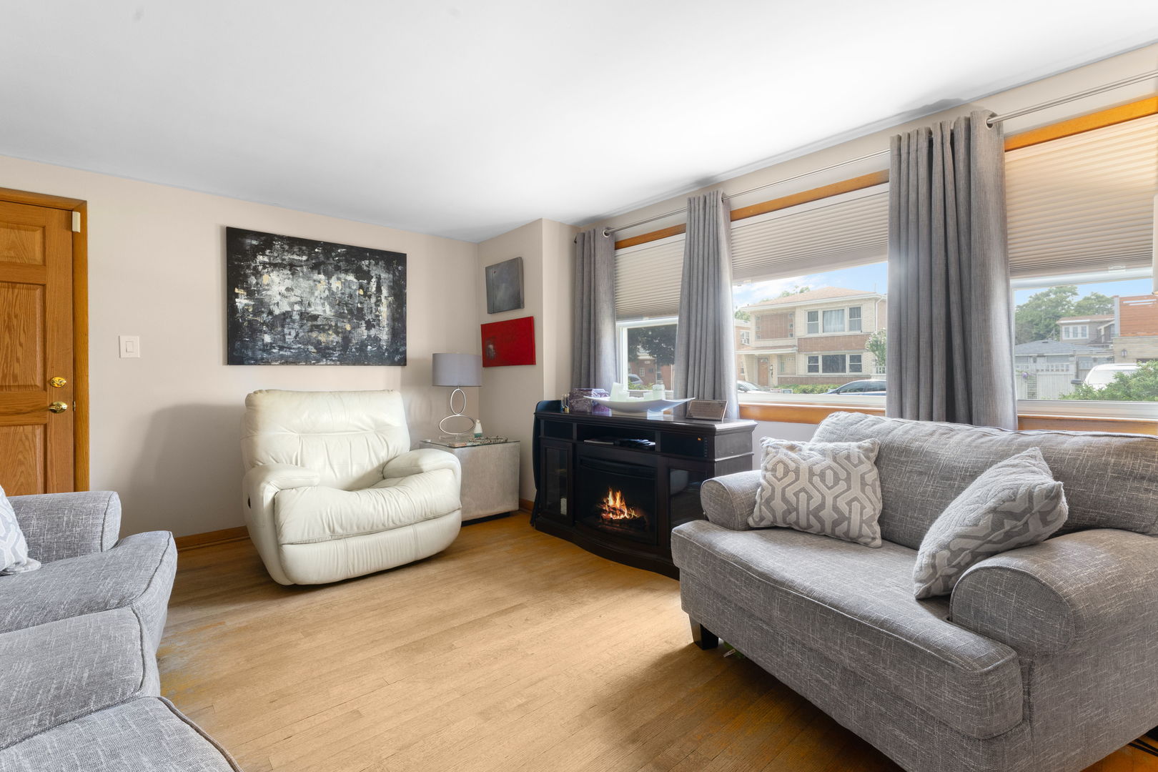 3807 Scoville Avenue Berwyn, IL 60402 - Photo 4 of 17 a living room with furniture and a large window