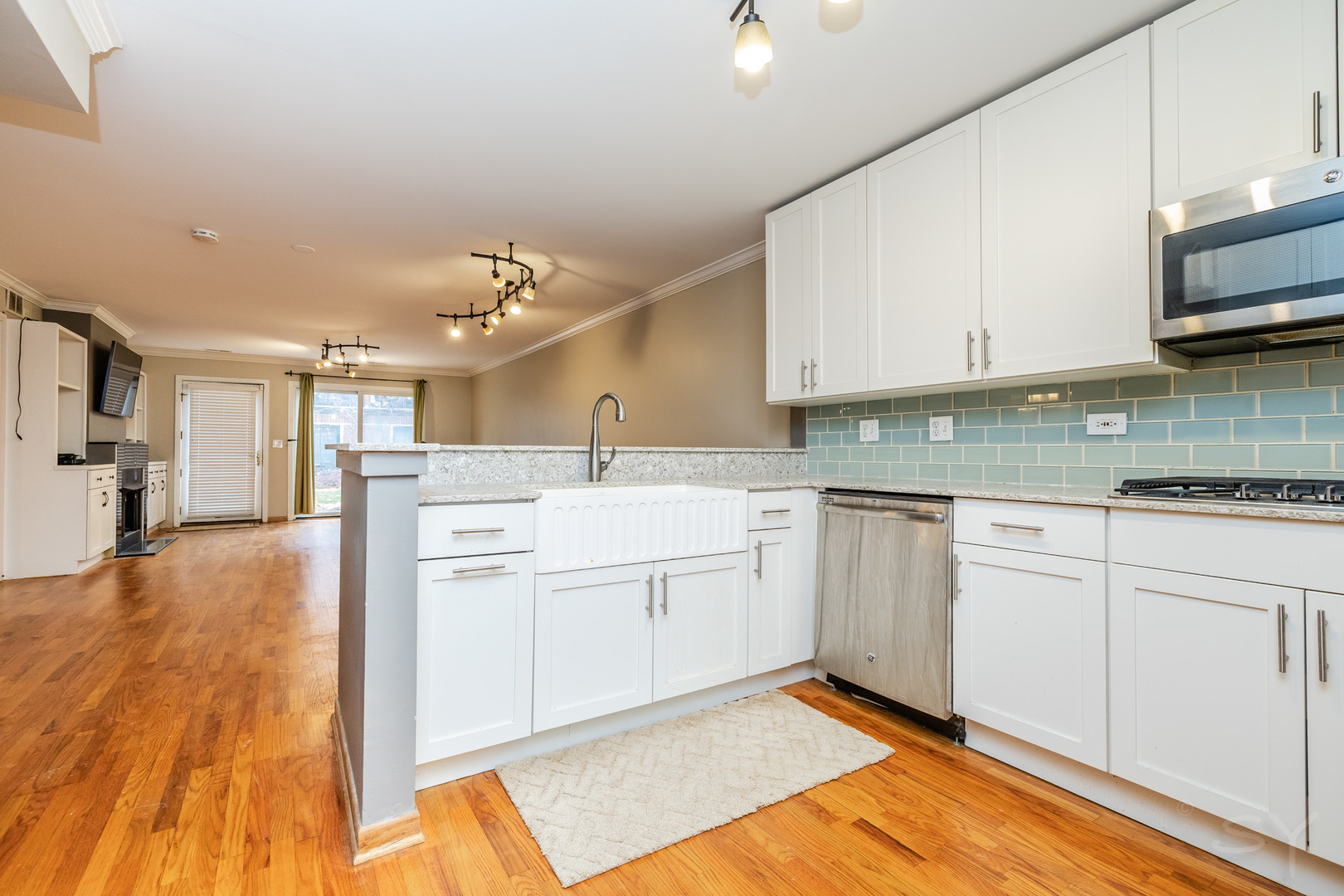 1812 South Federal Street, Unit 16 Chicago, IL 60616 - Photo 19 of 32 a kitchen with stainless steel appliances granite countertop a sink and cabinets