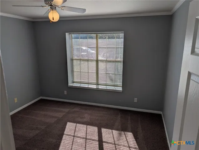 a bathroom with a toilet and a tub