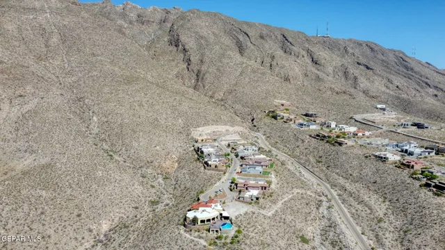 a aerial view of a house with a yard