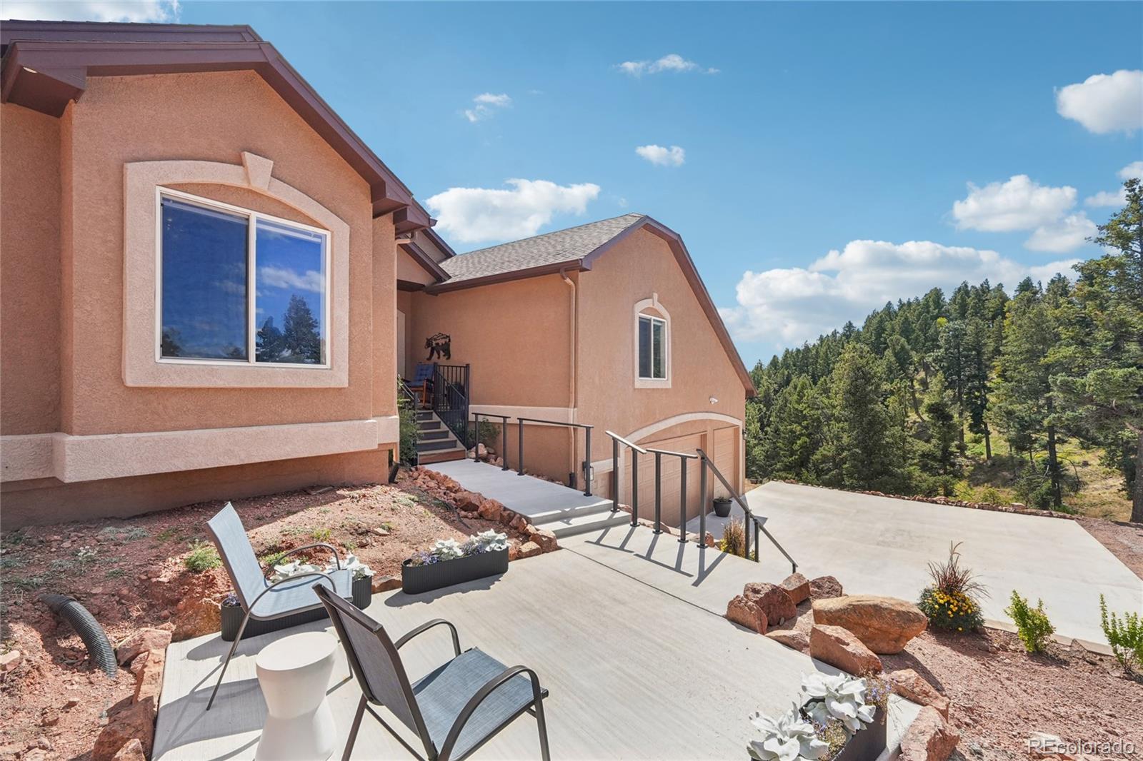 13084 Deer Ridge Way Larkspur, CO 80118 - Photo 44 of 48 a outdoor space with furniture