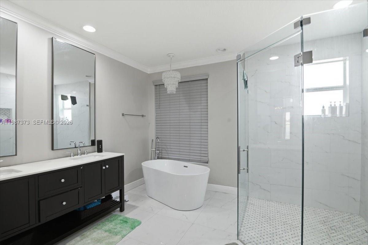 18631 Southwest 39th Street Miramar, FL 33029 - Photo 18 of 23 a bathroom with a toilet sink and mirror
