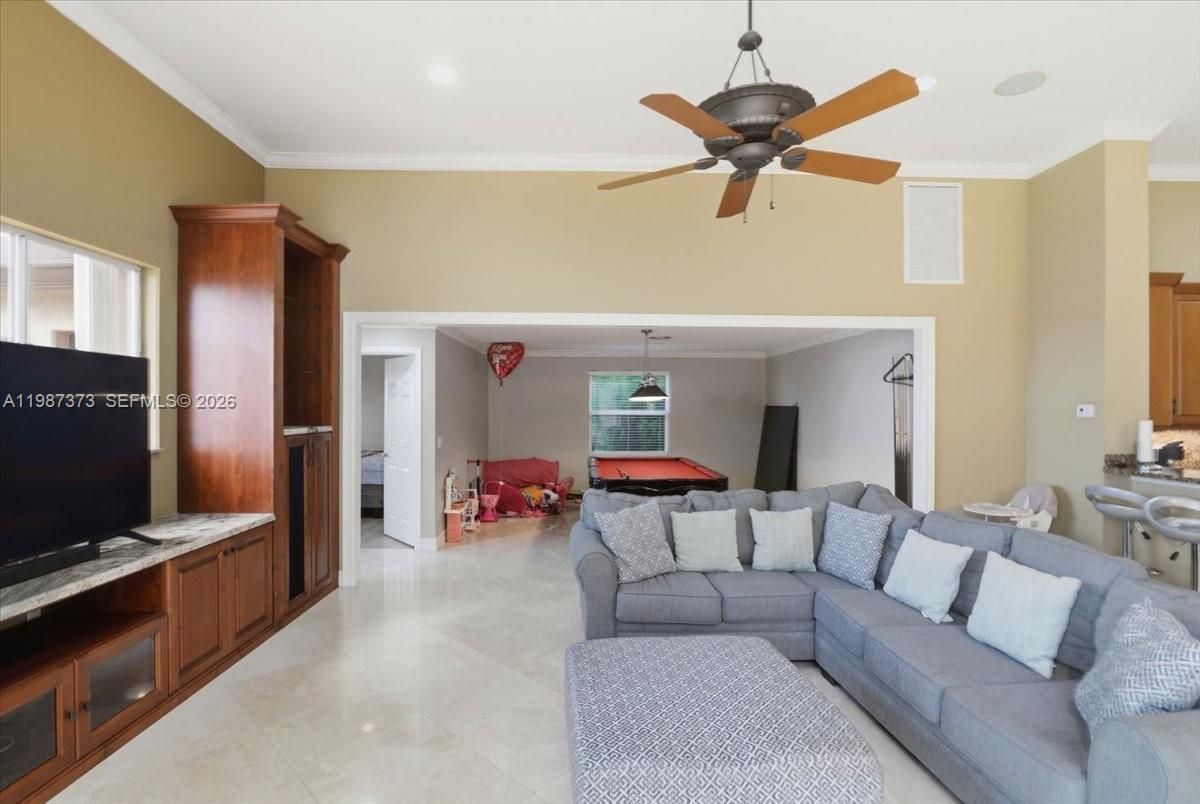 18631 Southwest 39th Street Miramar, FL 33029 - Photo 22 of 23 a living room with furniture