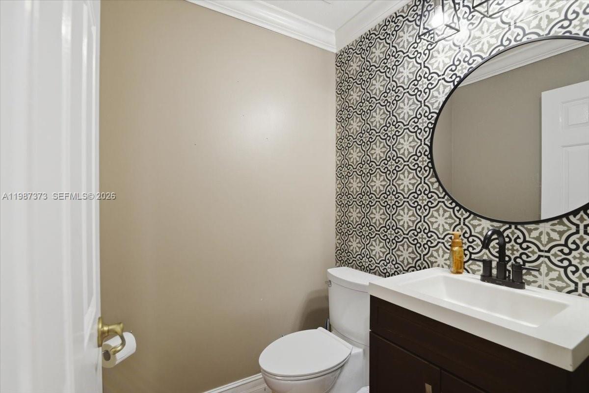 18631 Southwest 39th Street Miramar, FL 33029 - Photo 23 of 23 a bathroom with a toilet and a sink