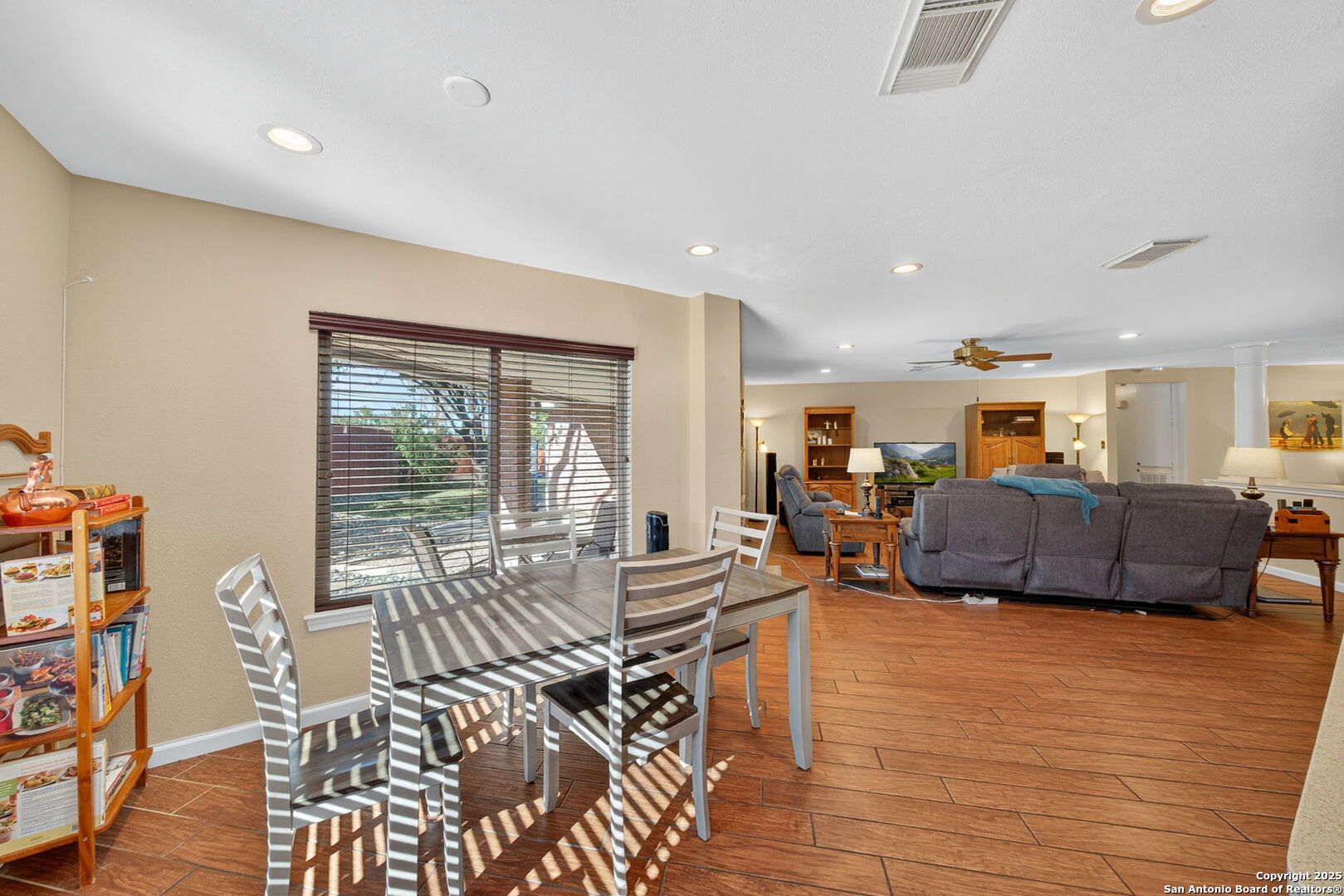 1902 Indian Meadows Drive San Antonio, TX 78230 - Photo 14 of 31 a living room with furniture and a flat screen tv