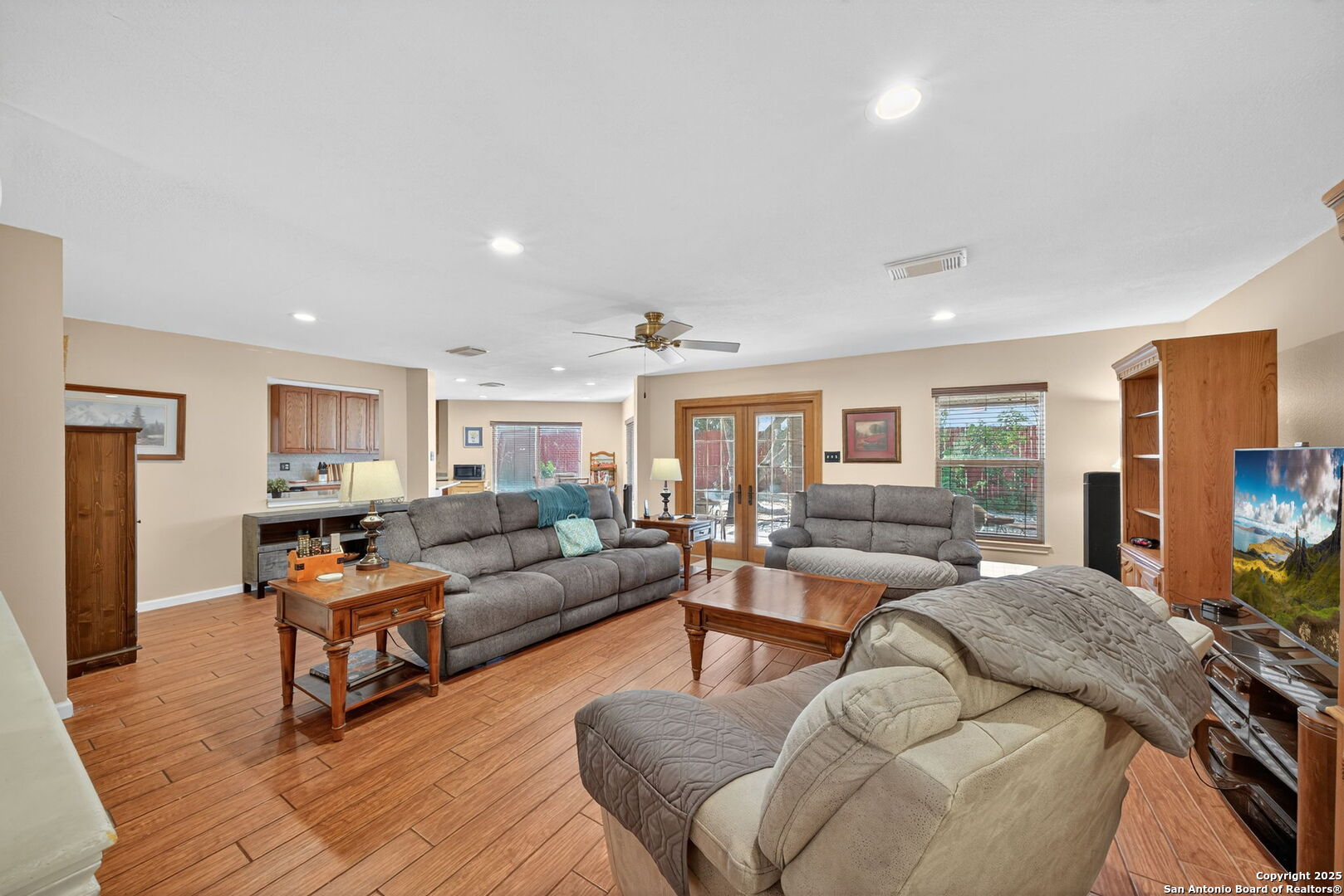 1902 Indian Meadows Drive San Antonio, TX 78230 - Photo 6 of 31 a living room with furniture and wooden floor