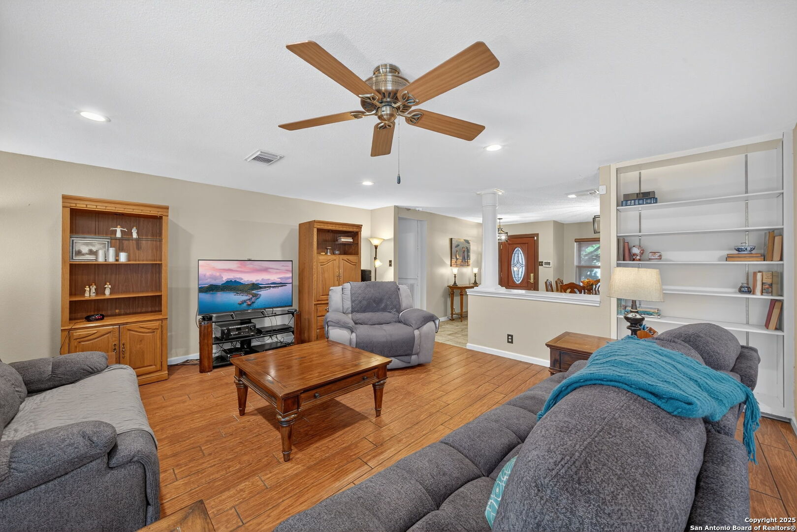 1902 Indian Meadows Drive San Antonio, TX 78230 - Photo 9 of 31 a living room with furniture and a ceiling fan