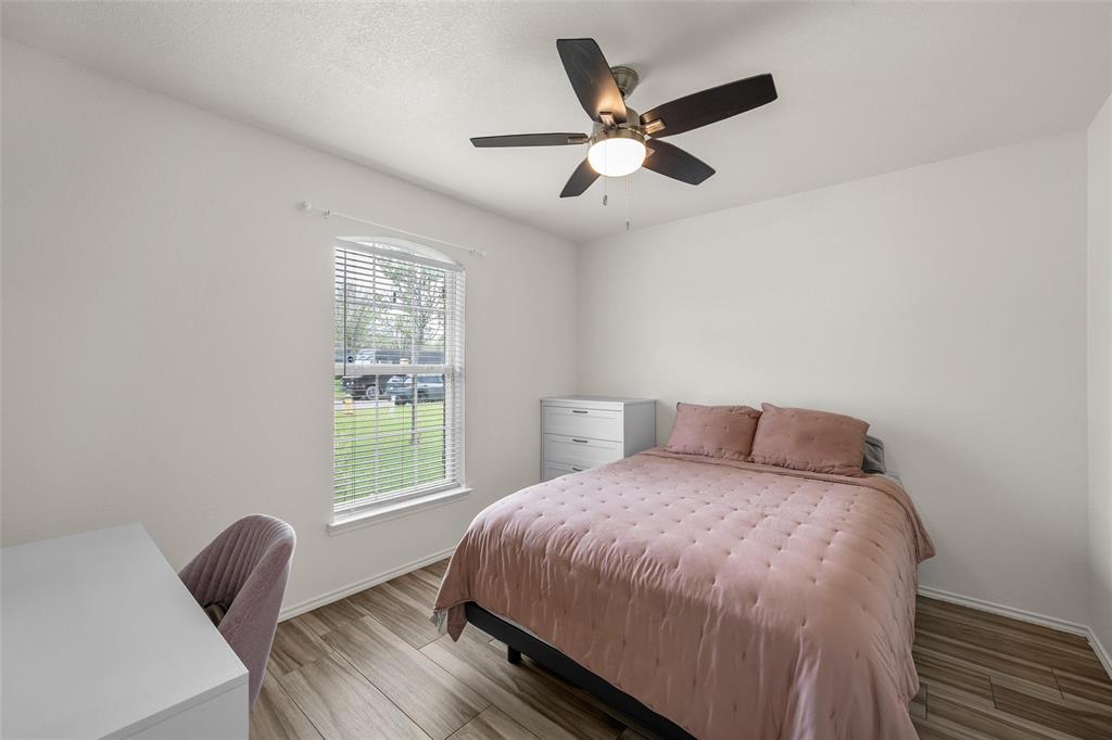 4209 Rance Lane Waco, TX 76708 - Photo 14 of 26 a bedroom with a bed and a window