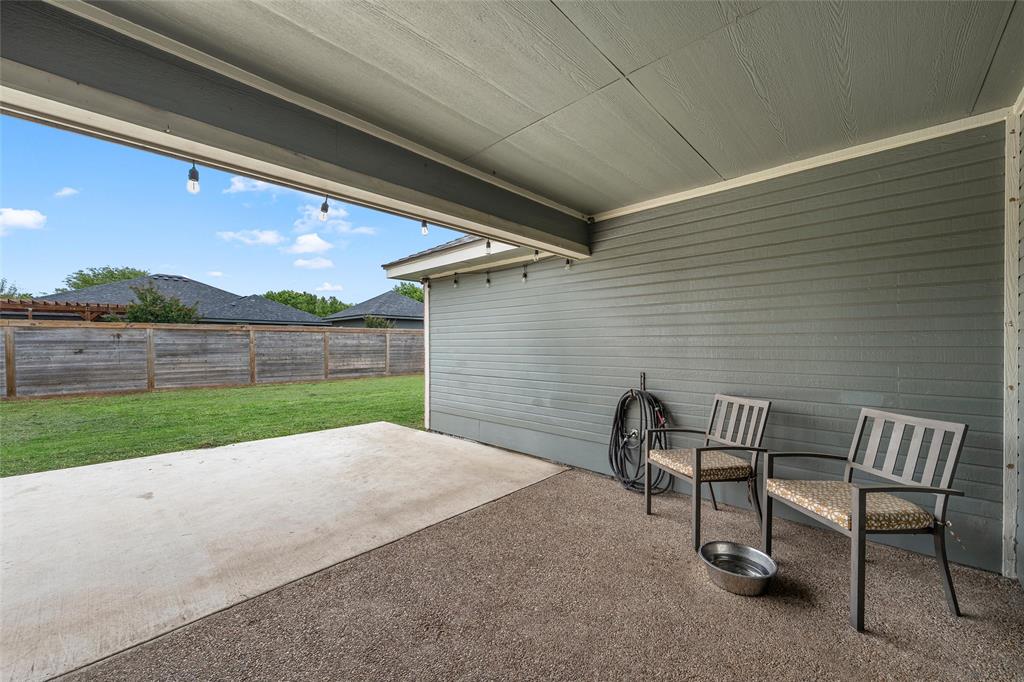 4209 Rance Lane Waco, TX 76708 - Photo 18 of 26 a backyard view with a chair and table