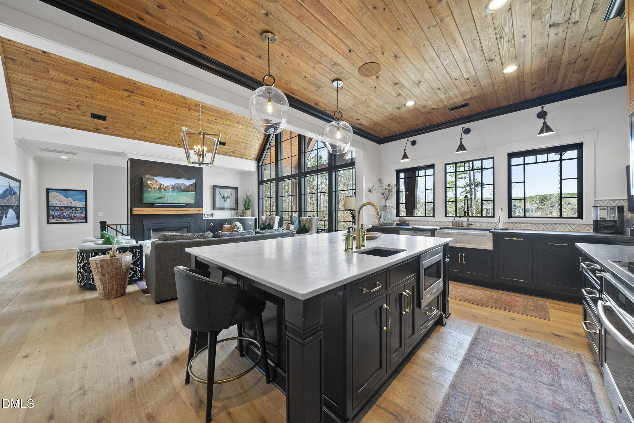 935 Estate Road Semora, NC 27343 - Photo 12 of 75 a kitchen with a stove a counter space and stainless steel appliances
