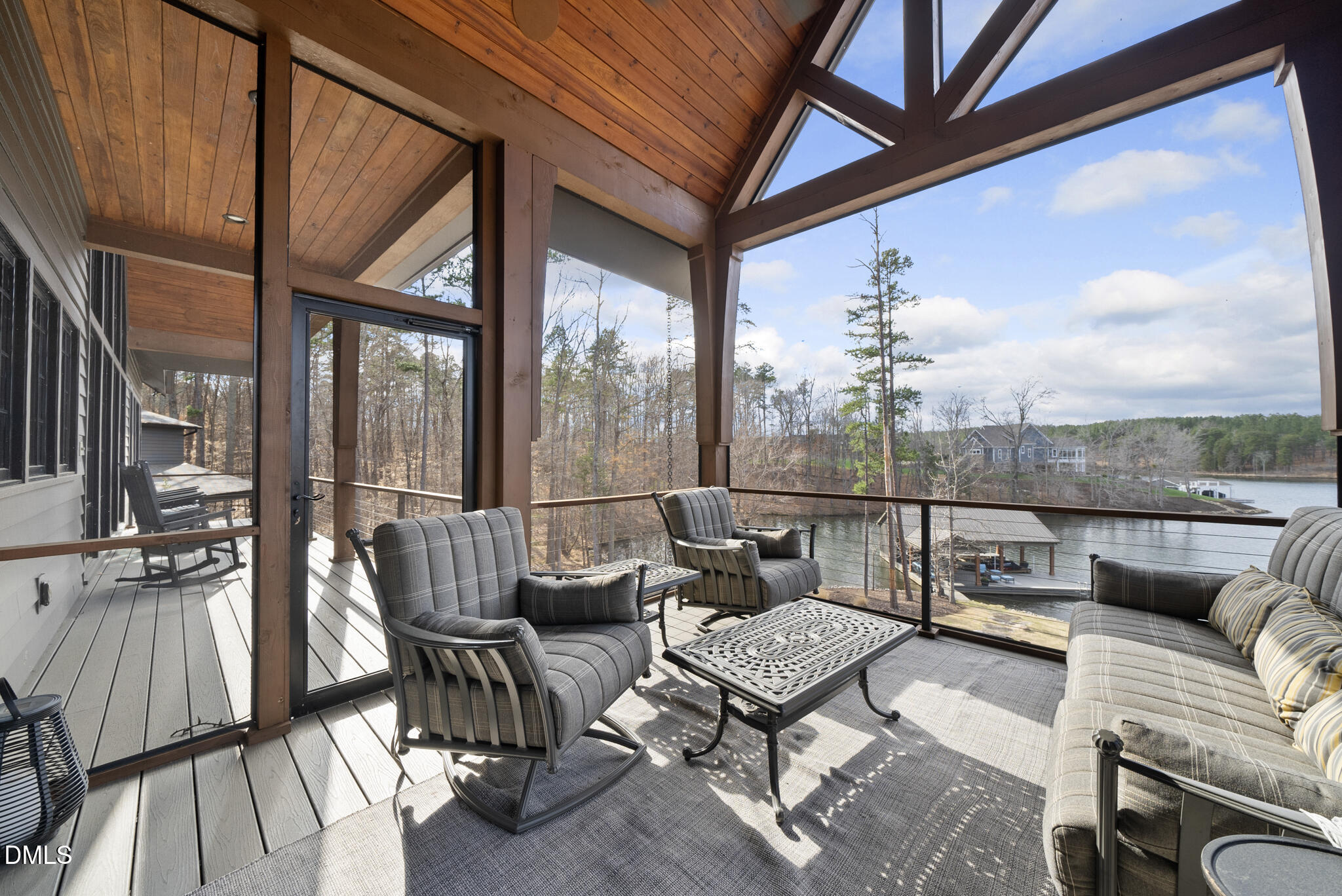 935 Estate Road Semora, NC 27343 - Photo 16 of 75 a living room with furniture and a floor to ceiling window
