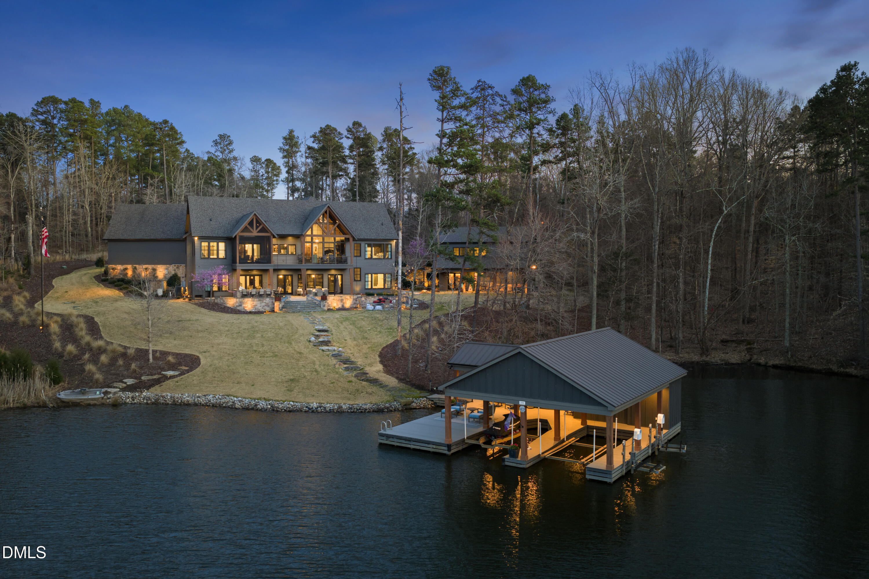 935 Estate Road Semora, NC 27343 - Photo 2 of 75 a view of a lake in middle of the town
