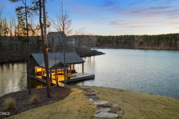 swimming pool view with a sitting space