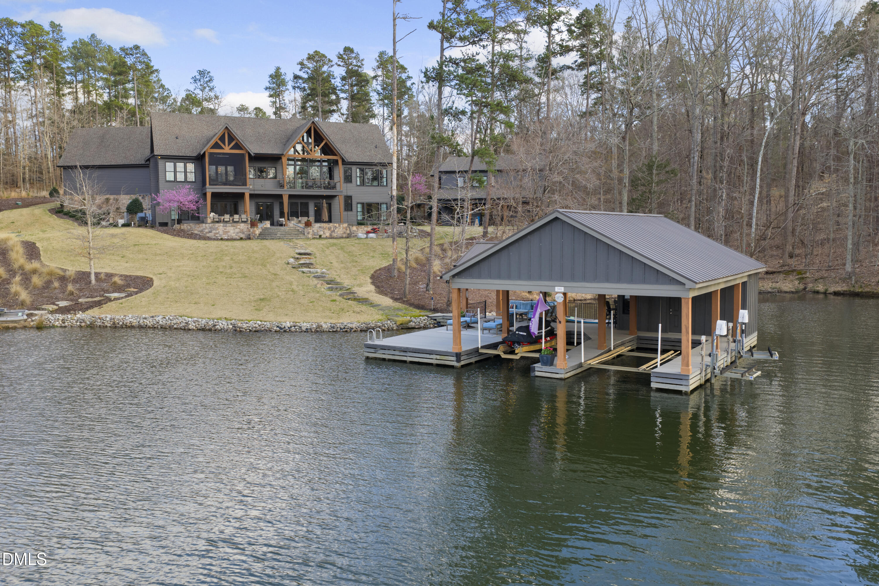 935 Estate Road Semora, NC 27343 - Photo 30 of 75 a view of a house with pool and sitting area